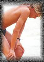 Lifesavers take their malibu boards out in massive surf - wonder if this dude is worried.